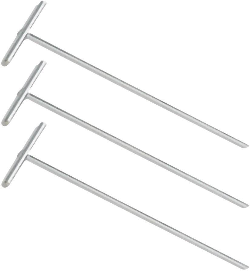 Drei silberne Zeltheringe in T-Form, die nebeneinander liegen. Sie sind gleichmäßig angeordnet und zeigen eine einheitliche Struktur.