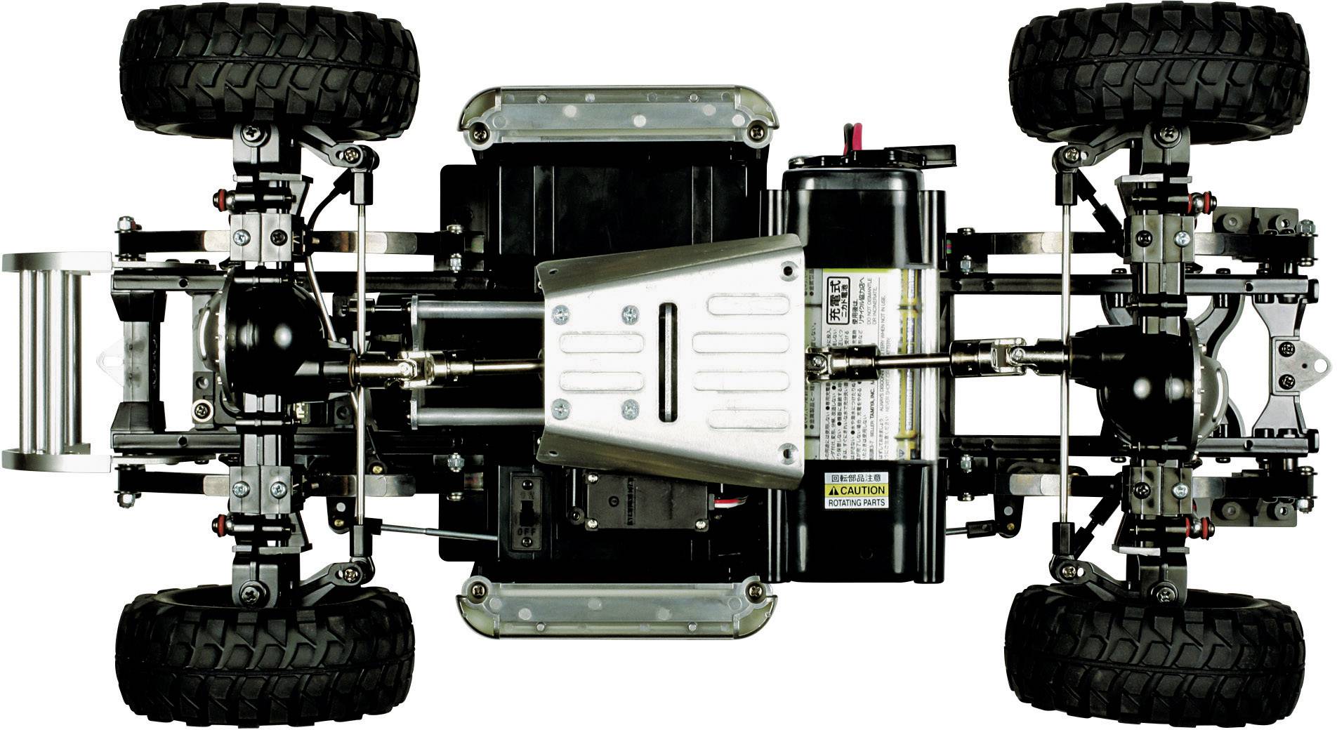 Ansicht des Unterbodens eines ferngesteuerten Autos mit detaillierter Federung und Antriebsstrang. Offroad-Reifen sind sichtbar.