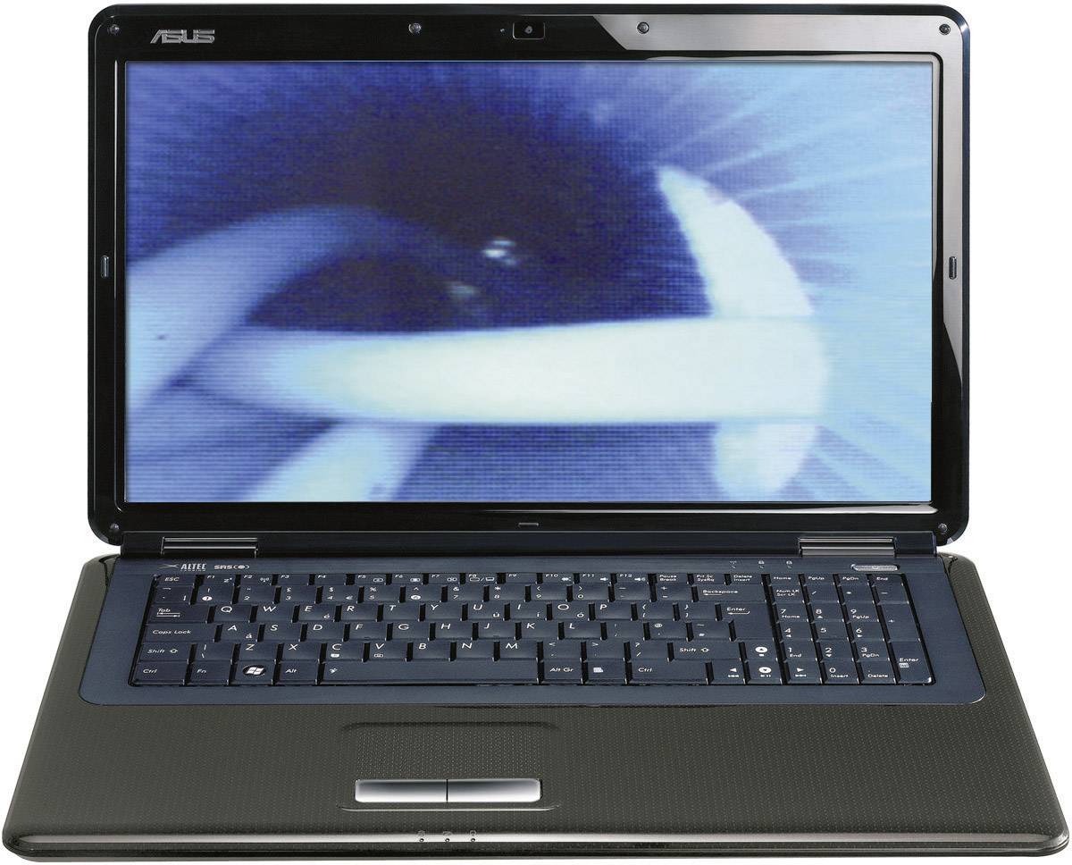 Ein geöffneter Laptop mit einem leuchtenden, unscharfen Display mit blauen und weißen Farben, darauf zwei verschlungene Formen.