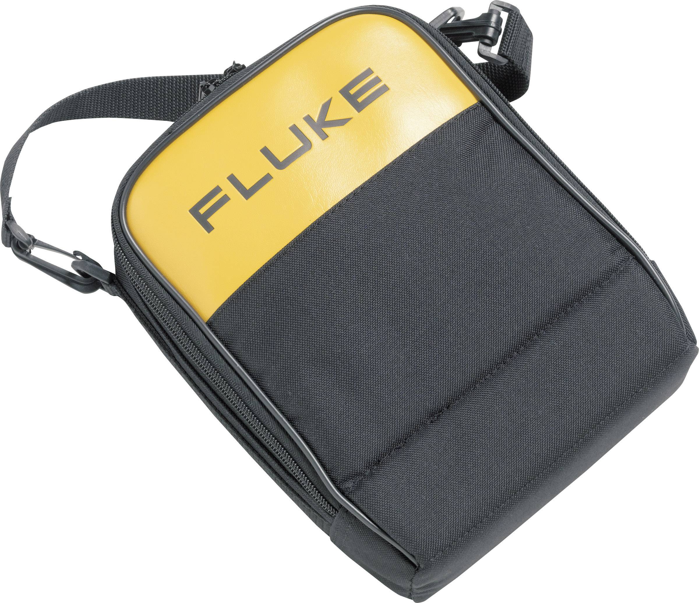 Eine kleine schwarze und gelbe Tasche mit einem Schulterriemen, auf der 'FLUKE' steht.