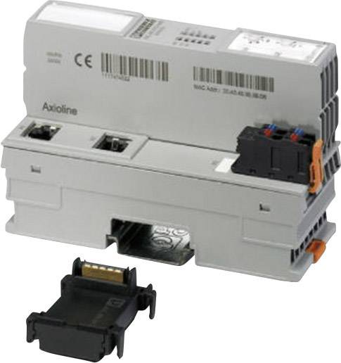 Eine graue industrielle Steuerungseinheit mit Anschlüssen und einem separaten Adapterstück, geeignet für Hutschienenmontage.