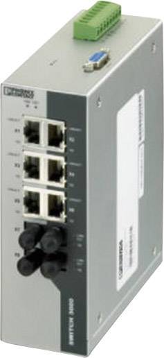 Ein grauer Ethernet-Switch mit vier Ethernet-Ports und zwei Glasfaseranschlüssen. Oben ein grüner Steckeranschluss. Gerät von Westermo.
