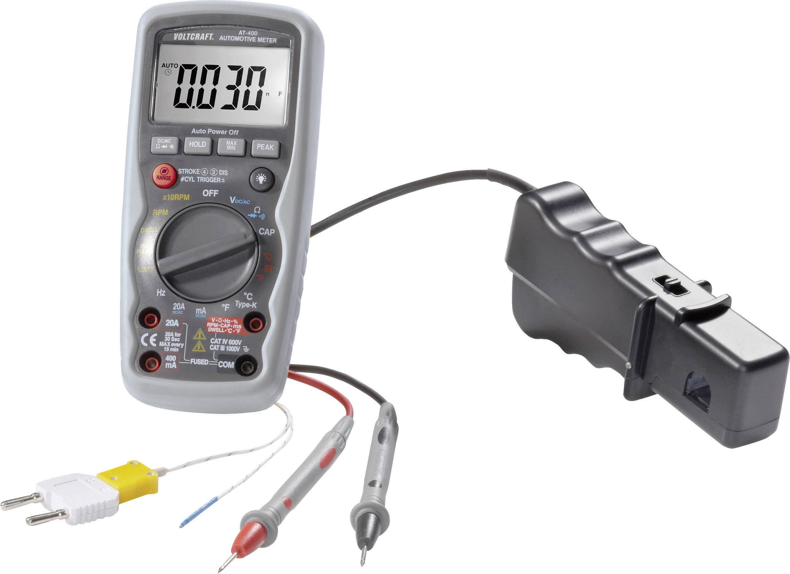 Ein digitales Multimeter misst eine Spannung von 0,730 V. Es ist mit zwei Messleitungen und einem Temperatursensor ausgestattet.