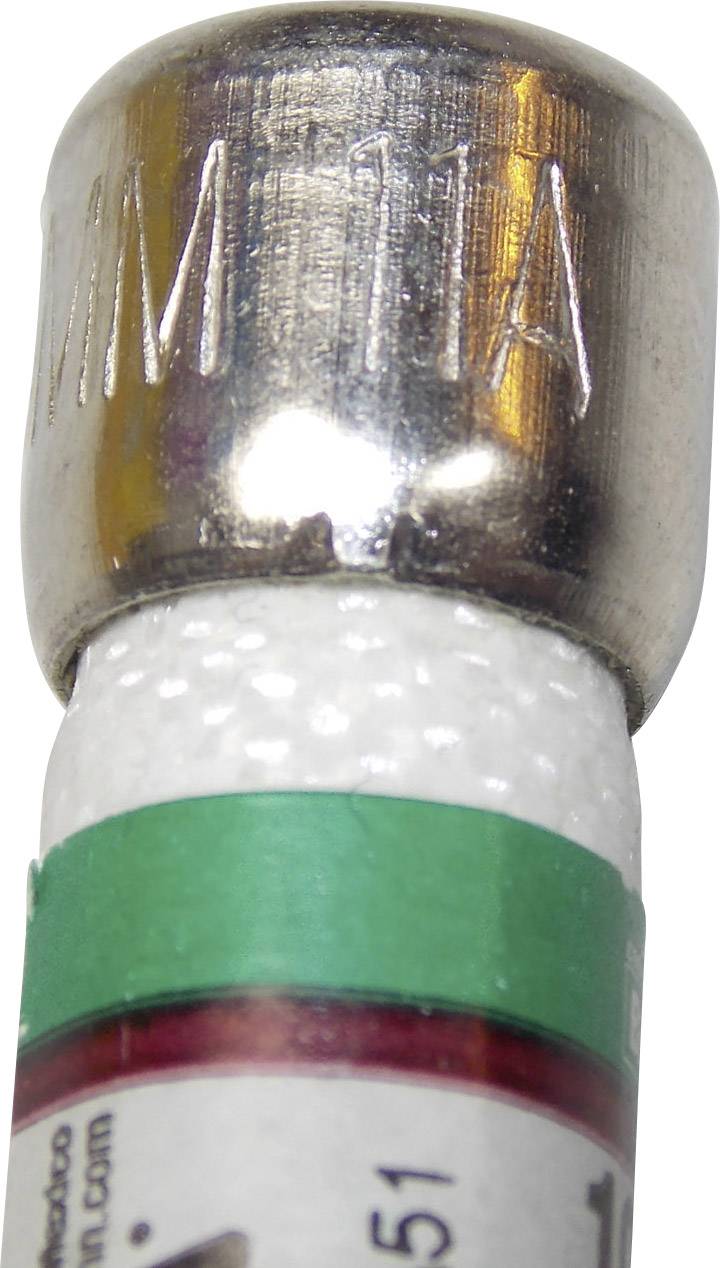 Eine Rakete oder ein Böller mit silbernem Kopf und grüner sowie roter Banderole, Nahaufnahme der oberen Kappe mit eingeprägter Nummer.