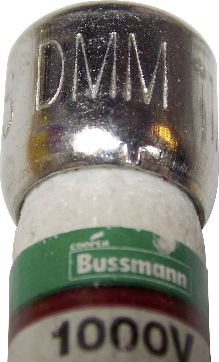 Nahaufnahme einer 1000V Cooper Bussmann DMM-Sicherung mit silbernem Kopf und grüner Beschriftung.