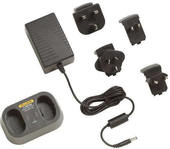 Ladegerät mit mehreren internationalen Steckeradaptern, geeignet für elektronische Geräte.