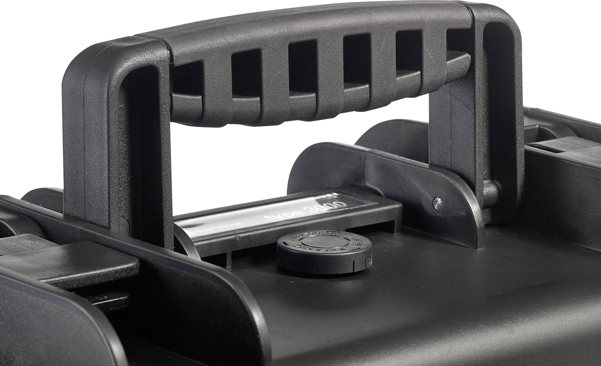 Ein schwarzer, robuster Handgriff eines Koffers mit einem Verschlussknopf darunter, geeignet für sicheren Transport.