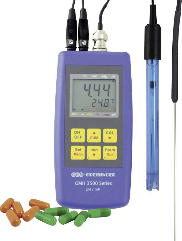 pH-Meter mit Anzeige '4.44', Verdrahtung und Elektroden, umgeben von grünen und orangefarbenen Kapseln.