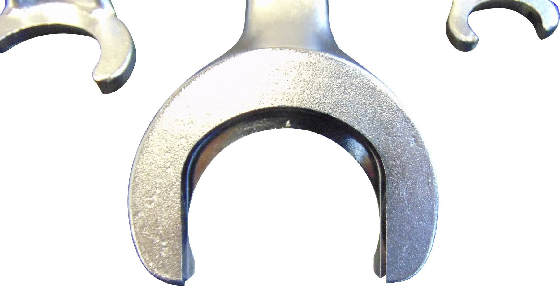 Metallschlüssel mit halbkreisförmiger Öffnung im Zentrum, umgeben von ähnlichen Werkzeugen. Ideal für Schrauben mit spezieller Form.