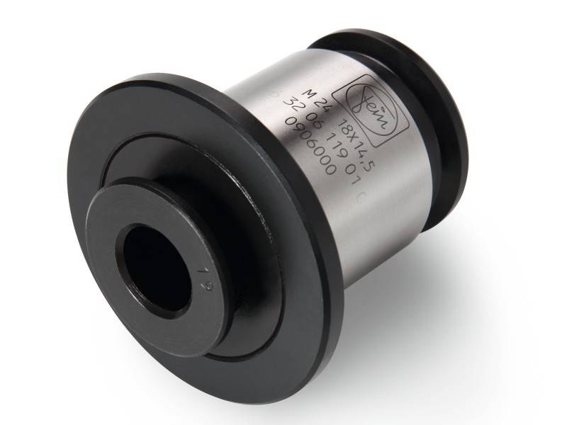 Zylinderförmiges Maschinenbauteil aus Metall mit eingeprägten technischen Spezifikationen und Logo; dient als Bestandteil in Maschinen.