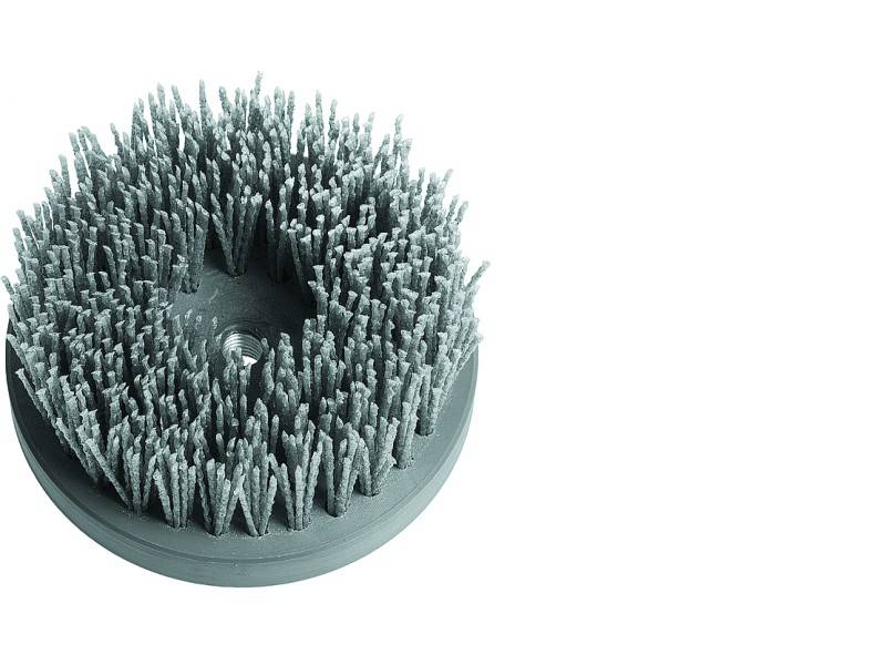 Runde Drahtbürste mit Borsten aus Metall, geeignet zur Reinigung von Oberflächen und Entfernung von Rost.