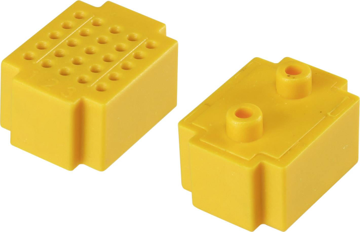 Gelbe Bausteine mit Löchern auf der einen und Noppen auf der anderen Seite, ähnlich Lego-Steinen.