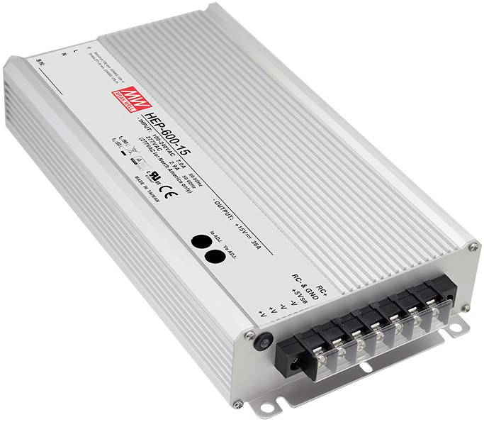 Ein weißes Elektronikgerät mit mehreren Anschlussklemmen und der Aufschrift 'MEAN WELL HE-800-15'. Es dient zur Stromversorgung.