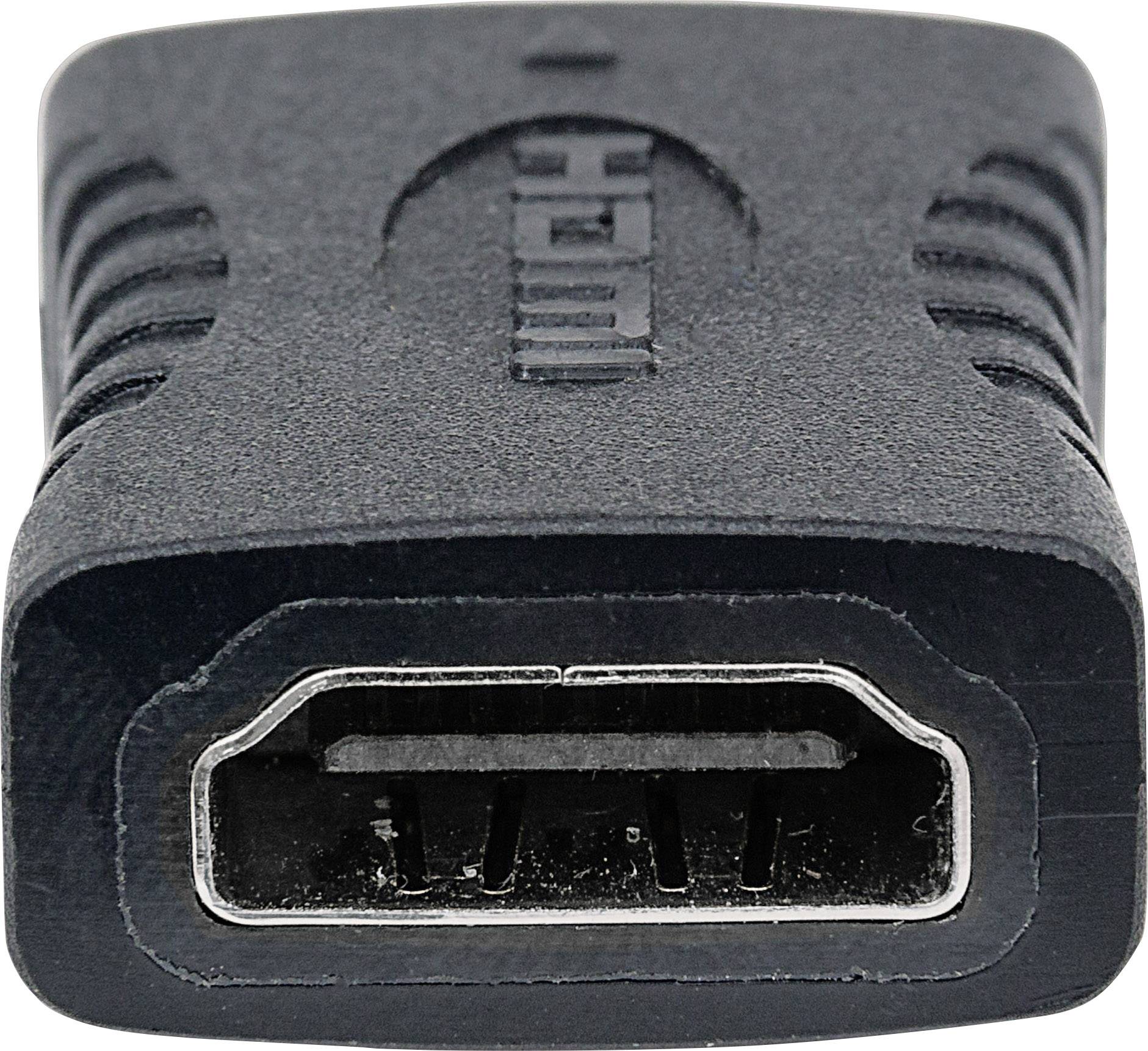 Nahaufnahme eines HDMI-Anschlusses, der auf einem schwarzen Adapter befestigt ist. Der Adapter hat eine strukturierte Oberfläche.