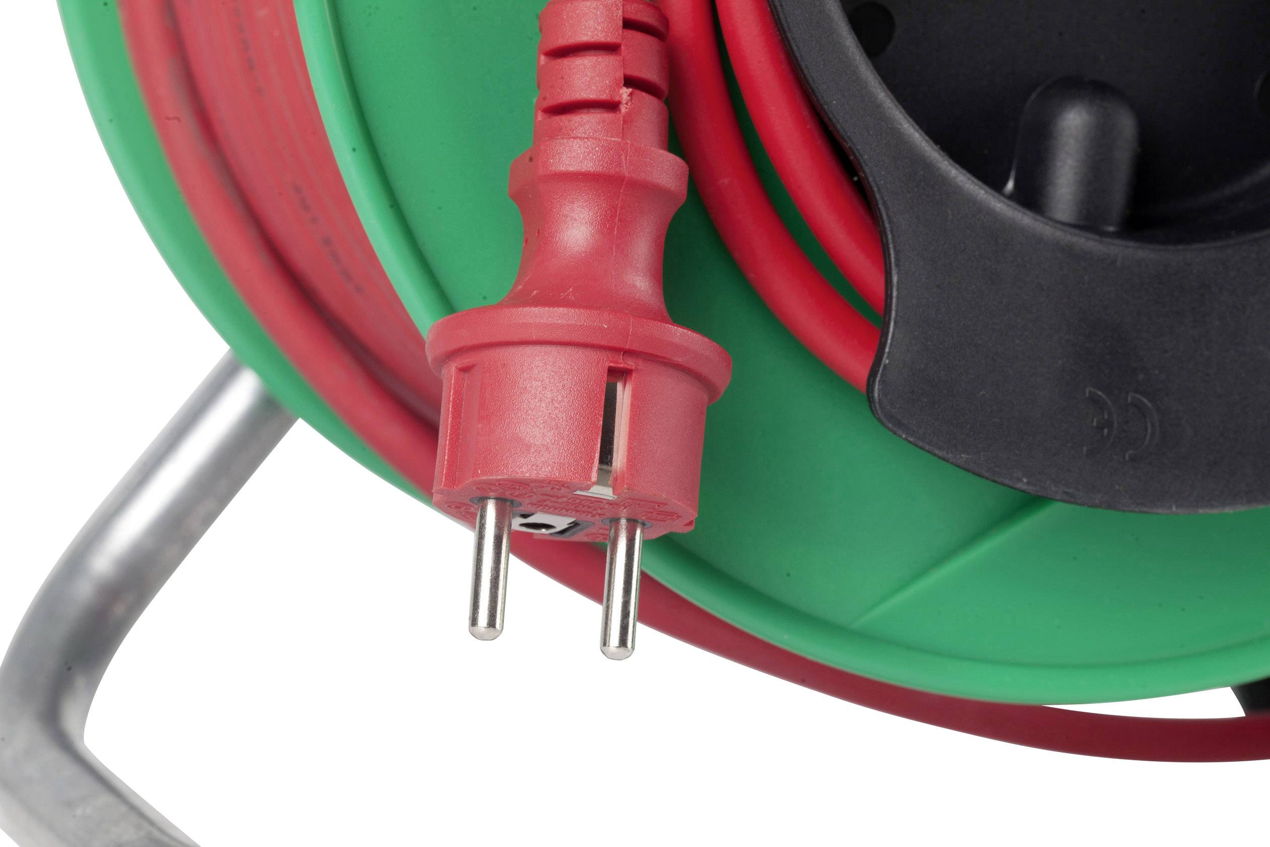 Rote Kabeltrommel mit grünem Gehäuse, aufgerolltes Kabel und roter Stecker.