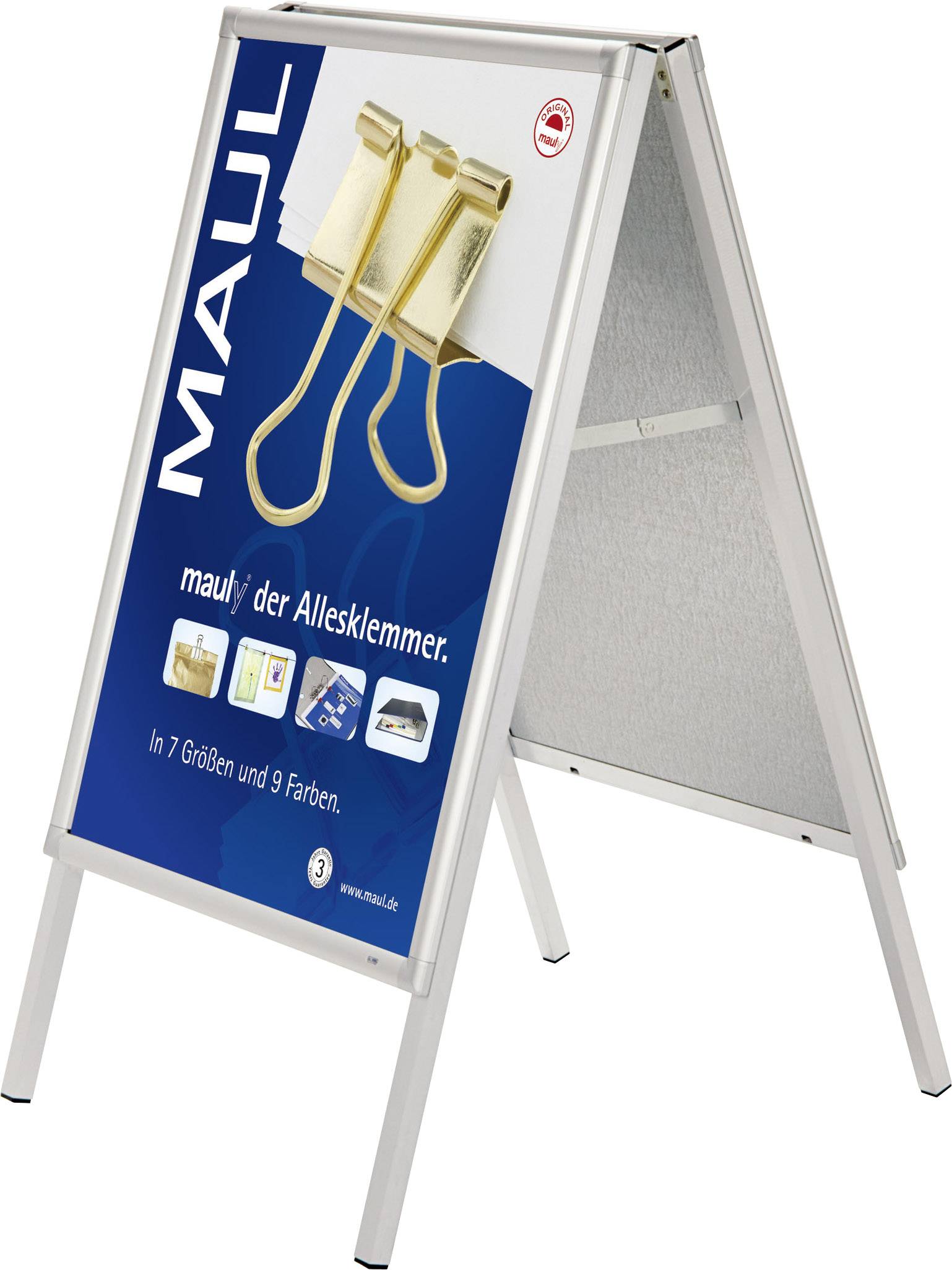 Ein Werbeplakat auf einem Aufsteller zeigt einen goldenen Klammerclip und den Text 'maul der Allesklemmer'.
