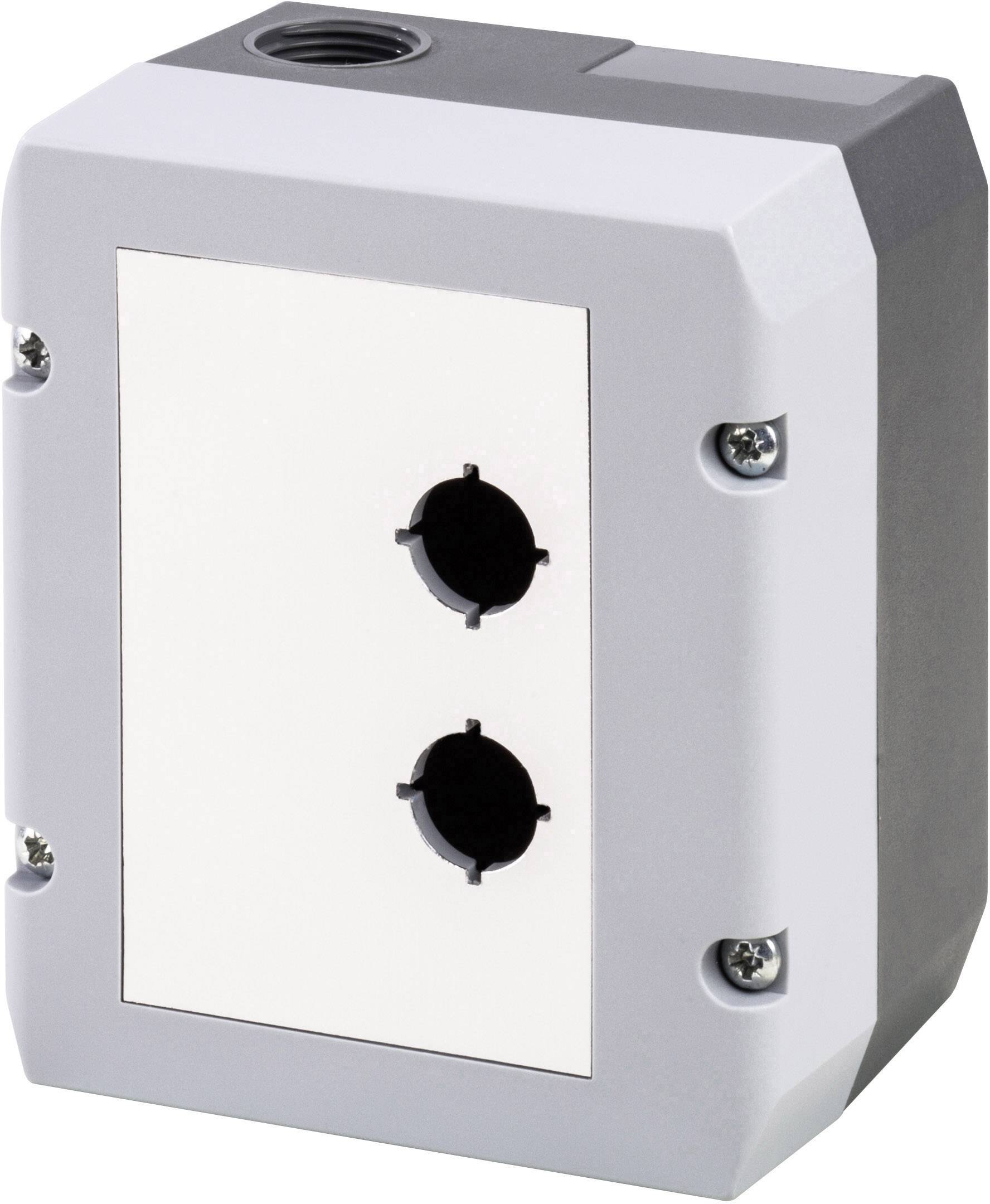 Ein graues Kunststoffgehäuse mit zwei schwarzen runden Öffnungen, geeignet für industrielle oder elektrische Anwendungen.