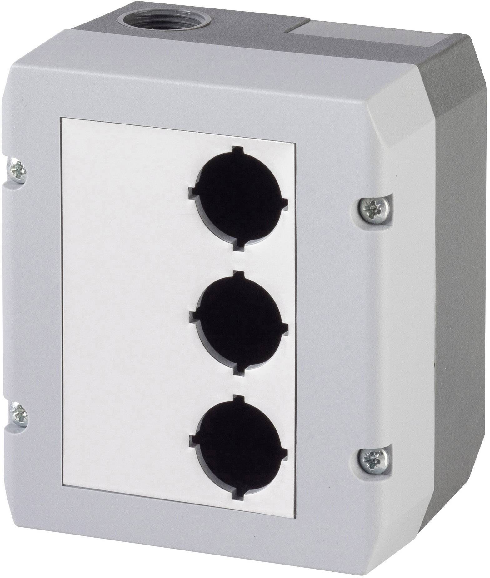 Graues Kunststoffgehäuse mit drei runden, schwarzen Öffnungen auf der Vorderseite. Es scheint für elektrische Installationen bestimmt zu sein.