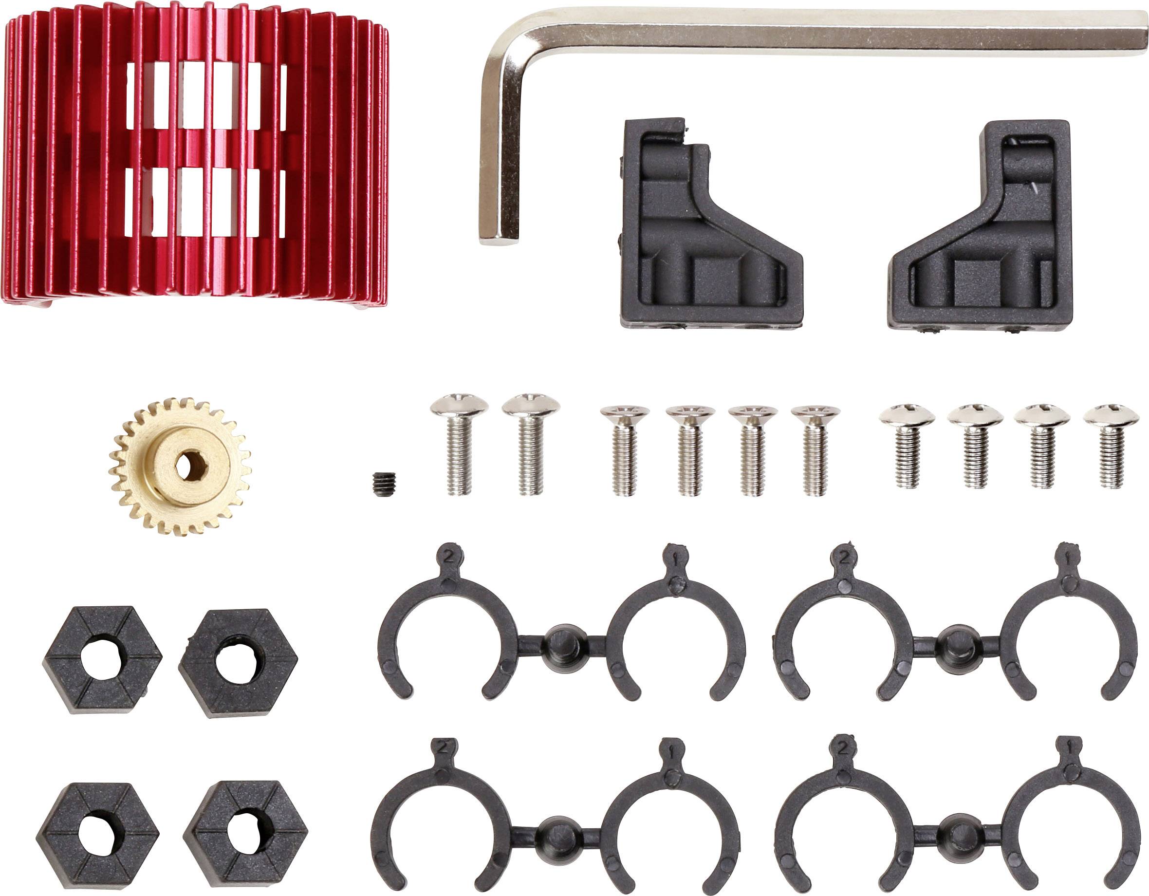 Ein Bausatz mit verschiedenen Teilen: rote Kühlrippe, Schrauben, ein Messingzahnrad, Kunststoffhalterungen und ein Inbusschlüssel.