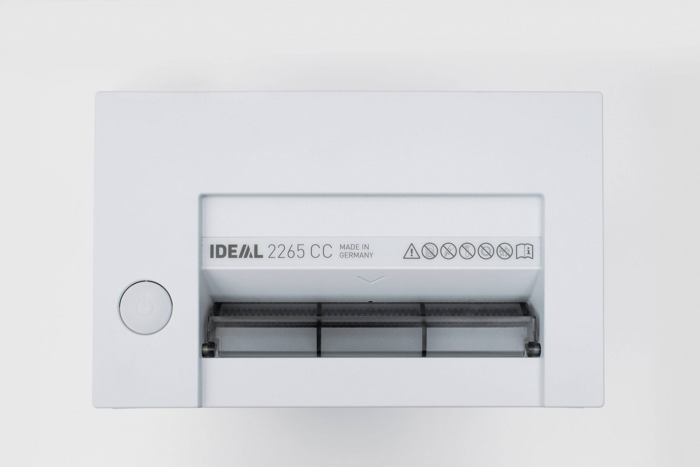 Papier-Schredder von oben mit Aufschrift 'IDEAL 2265 CC'. Enthält Symbole für Sicherheits- und Betriebsinformationen.