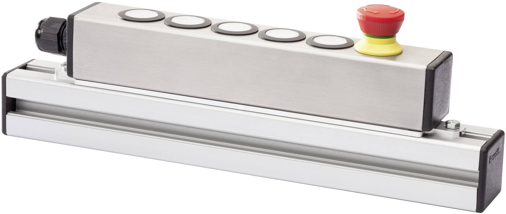 Eine längliche Steuerungseinheit mit fünf runden Tasten und einem roten Not-Aus-Knopf, montiert auf einer silbernen Schiene.