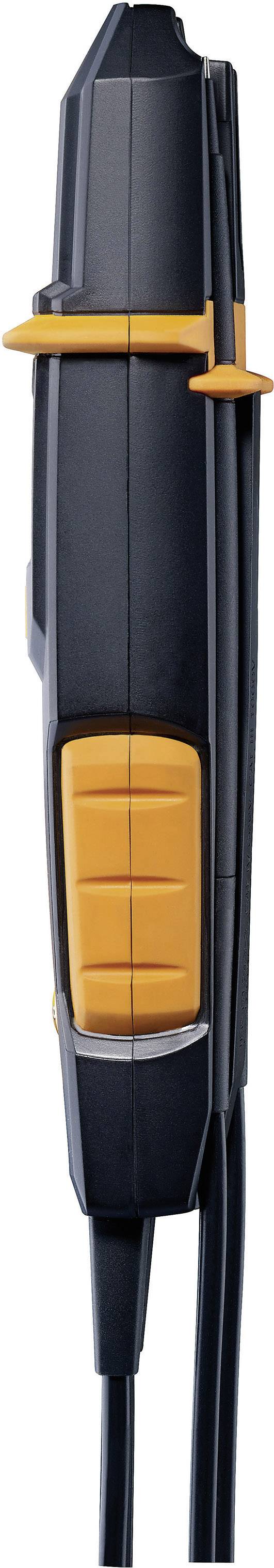 Seitenansicht eines elektrischen Geräts mit schwarzem Gehäuse und orangefarbenen Tasten, möglicherweise ein Werkzeug oder Instrument.