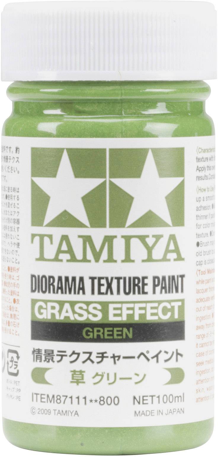 Eine grüne Flasche mit der Aufschrift 'Tamiya Diorama Texture Paint, Grass Effect, Green', 100 ml.