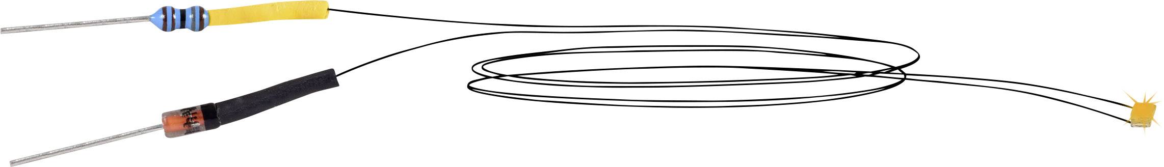 Ein flexibles Kabel verbindet zwei Metallspitzen, die von farbigen Isolatoren umhüllt sind. Eignet sich für elektrische Messungen.