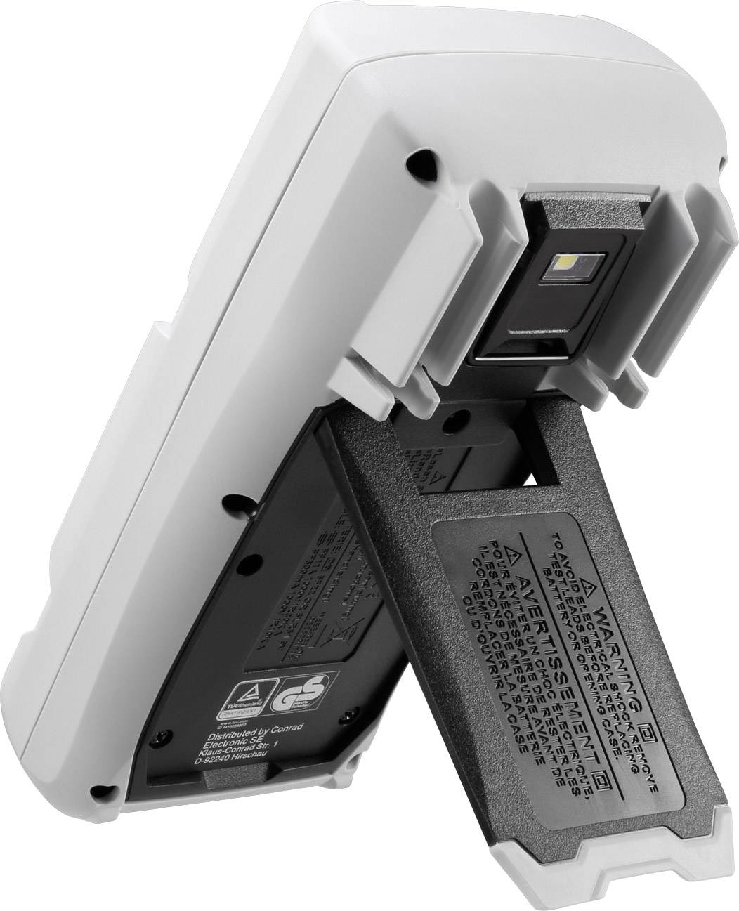 Ein digitales Messgerät mit offenem Batteriefach. Sichtbar sind Warnhinweise und die Rückseite des Geräts.