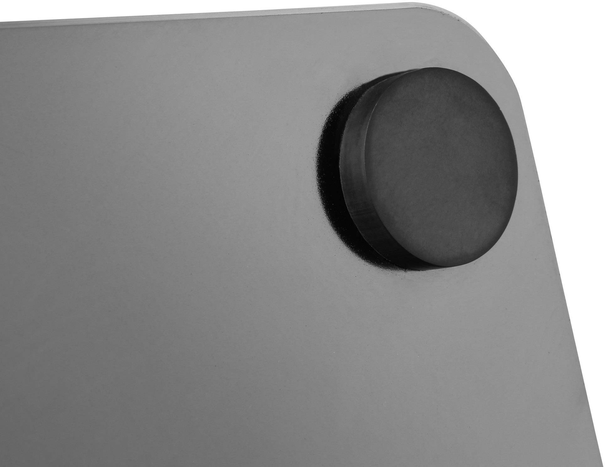 Eine runde, schwarze Magnettafelhalterung auf einer grauen magnetischen Fläche.