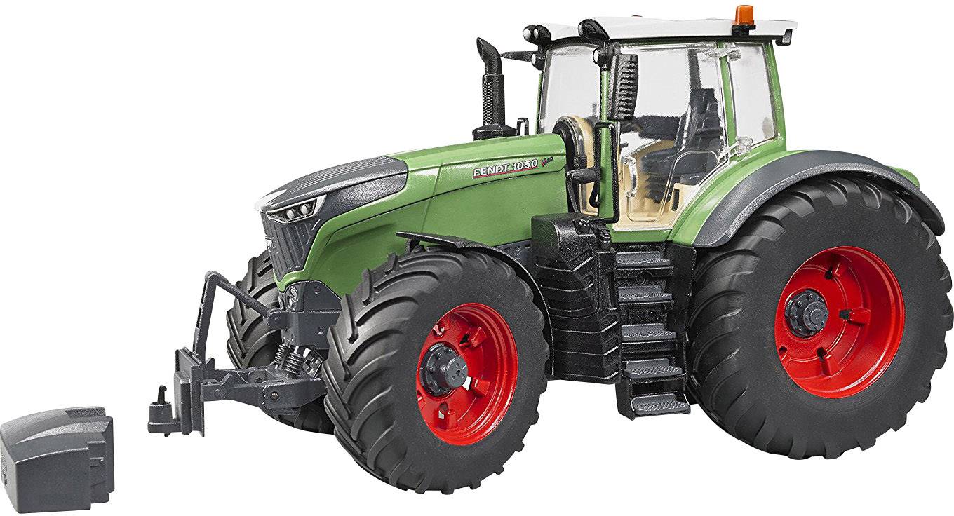 Ein grüner Traktor mit großen roten Rädern und einem schwarzen Fahrersitz steht aufrecht.
