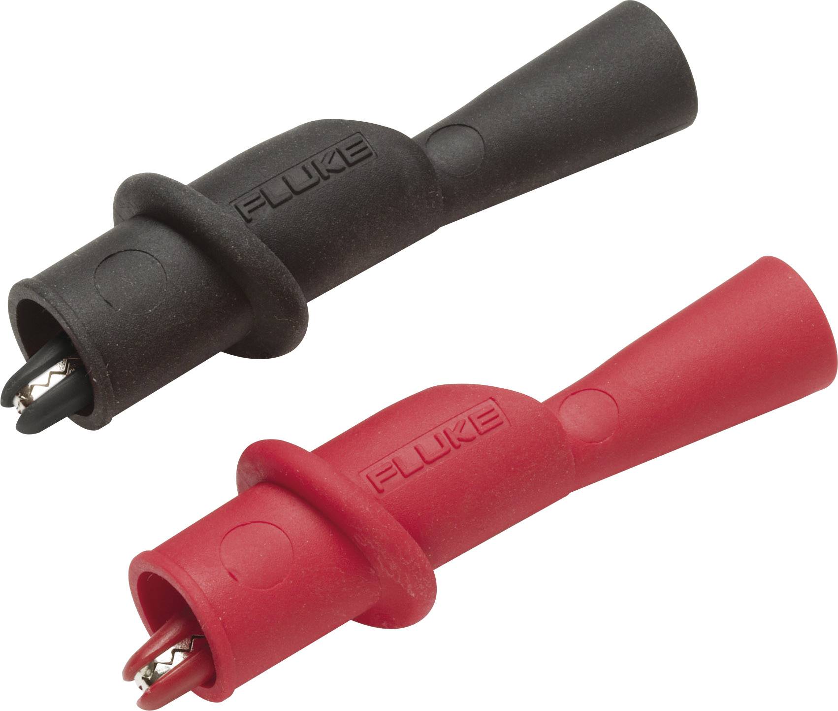 Zwei elektrische Krokodilklemmen, eine schwarz und eine rot, mit 'Fluke'-Aufschrift, zur sicheren Verbindung bei elektrischen Prüfungen.