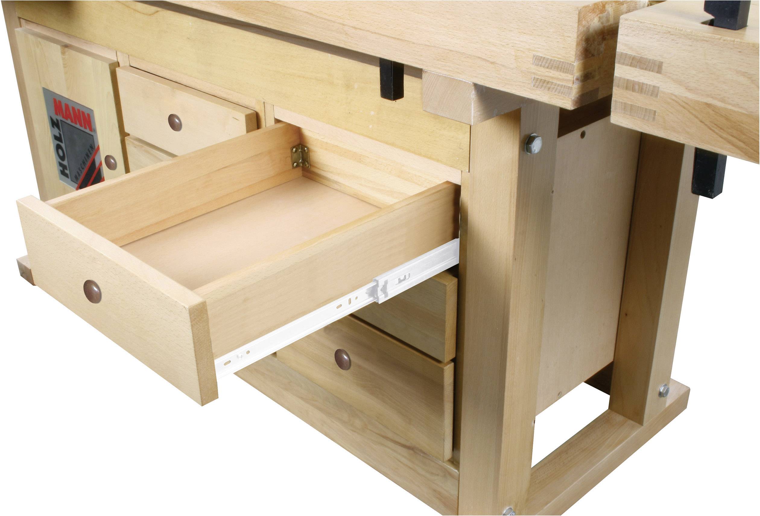 Zu sehen ist eine hölzerne Werkbank mit mehreren Schubladen. Eine Schublade ist geöffnet und zeigt die einfache Schiene.