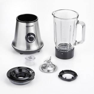Mixer mit Edelstahlgehäuse, Glasbehälter, Messer, Deckel und Zubehörteilen auf weißem Hintergrund. Ideal für Küchenanwendungen.