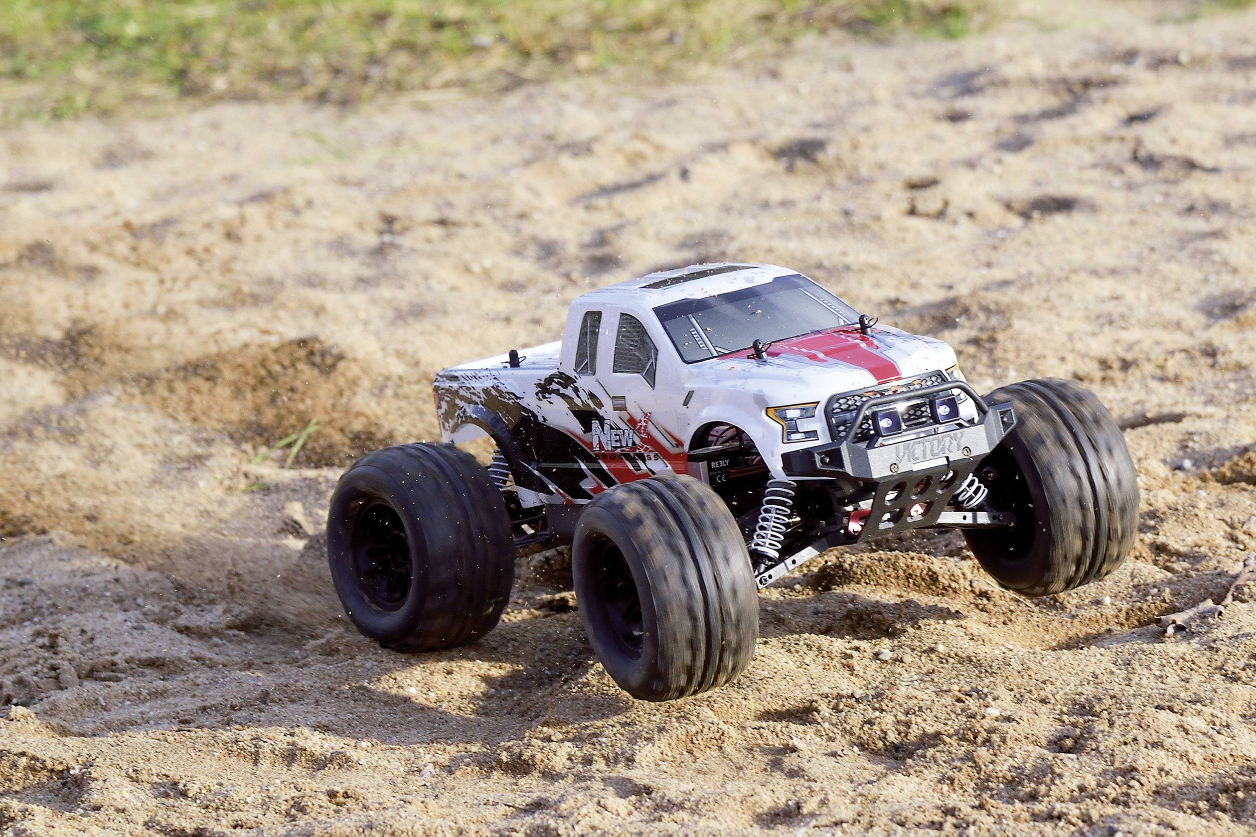 Reely NEW1 Brushless 1:10 RC Modellauto Elektro Monstertruck Allradantrieb (4WD) 100% RtR 2,4GHz inkl. Akku, Ladegerät und