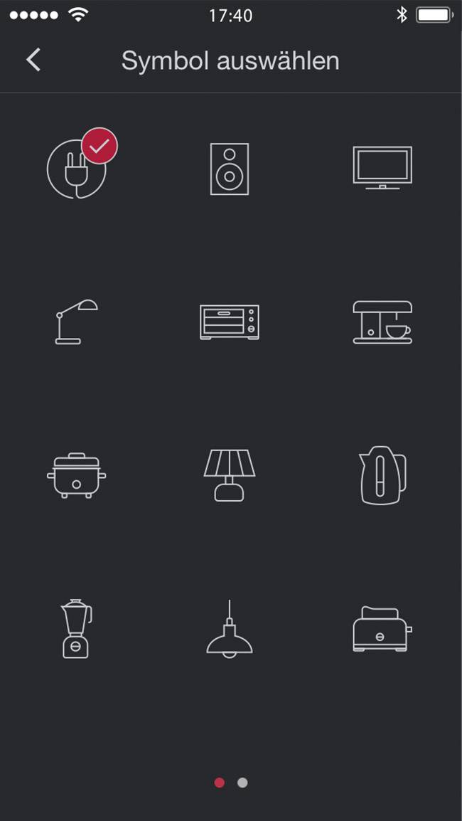 'Symbol auswählen' Bildschirm mit zwölf Symbolen für verschiedene Haushaltsgeräte, einschließlich Lampe, Lautsprecher, Fernseher, Kaffeemaschine und Toaster. Ein Symbol ist ausgewählt.