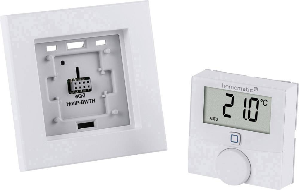 Zwei Teile eines Heizungsthermostats: Links eine Wandplatte für die Installation, rechts ein Display zeigt '21.0°C', darunter ein Drehregler.