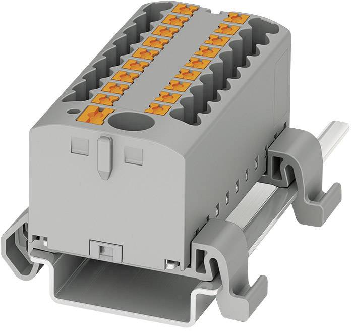 Ein graues elektrisches Verbindungselement mit mehreren Steckplätzen, montiert auf einer Metallschiene.