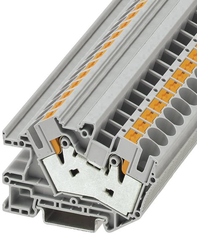 Ein grauer Steckverbinderblock mit mehreren orangefarbenen Klemmen, die für elektrische Verbindungen in Schaltschränken verwendet werden.