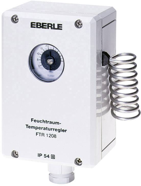 Ein weißer Feuchtraum-Temperaturregler mit der Aufschrift 'Eberle' und 'FTR 1208', neben einer Metallspirale, zeigt die Temperaturanzeige.