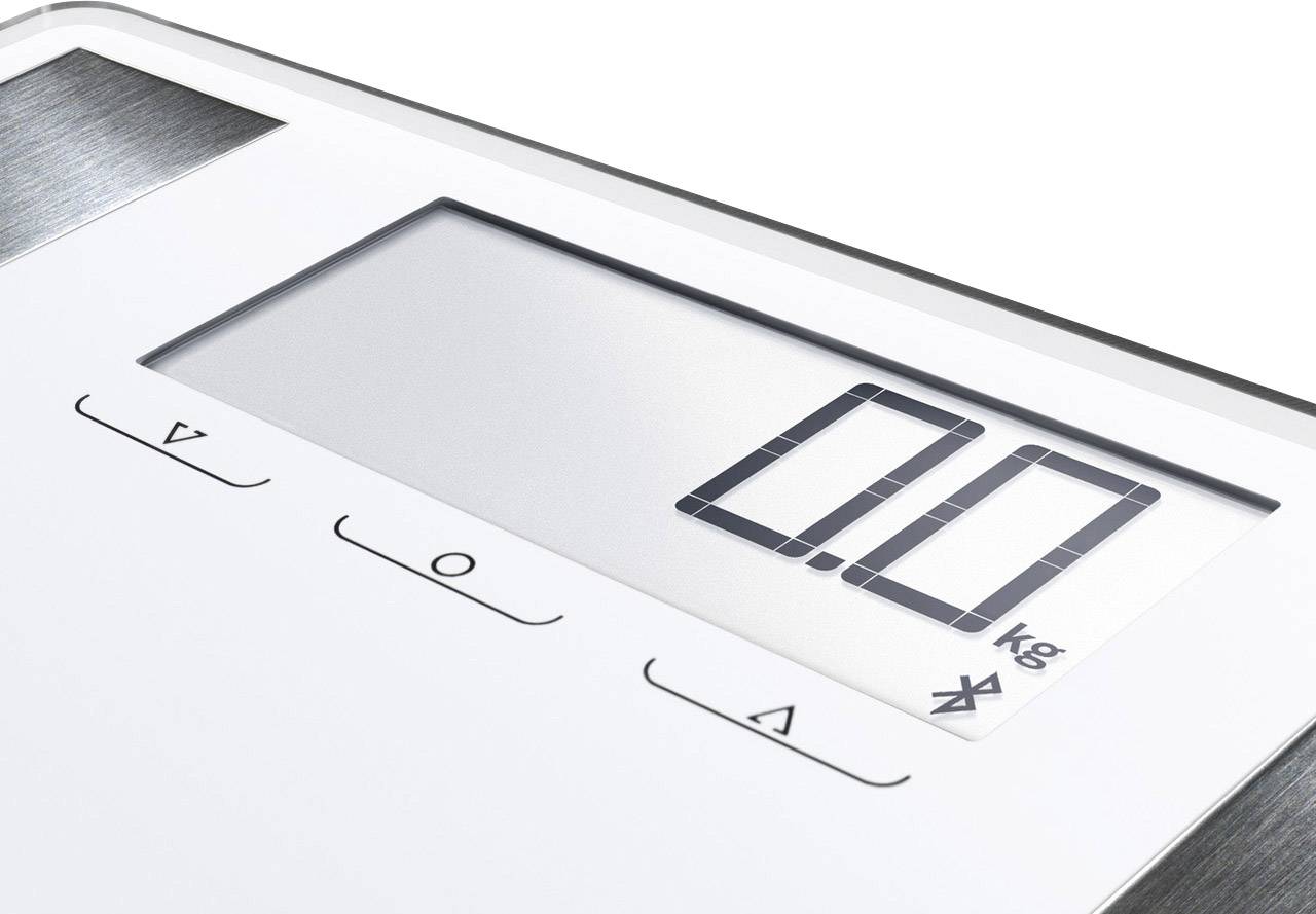 Elektronische Waage mit digitaler Anzeige zeigt '0,0 kg'. Bedienknöpfe darunter. Silberner Rand deutet auf modernes Design hin.