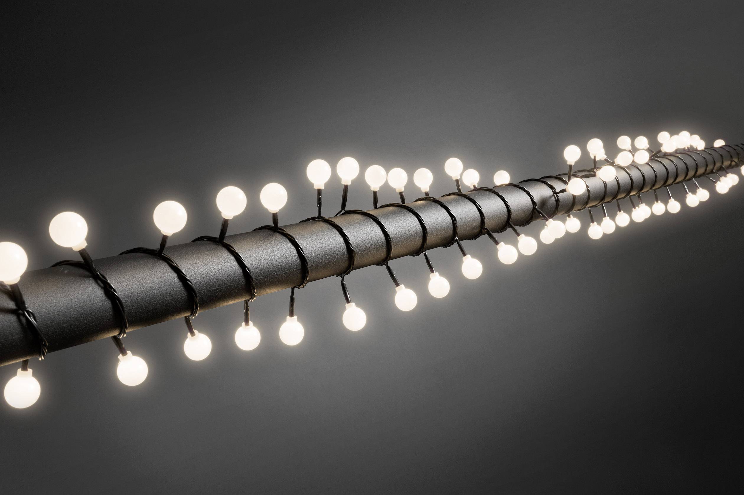 Konstsmide 3696-107 Mini-Lichterkette Außen netzbetrieben Anzahl Leuchtmittel 80 LED Warmweiß Beleuchtete Länge: 6.32 m