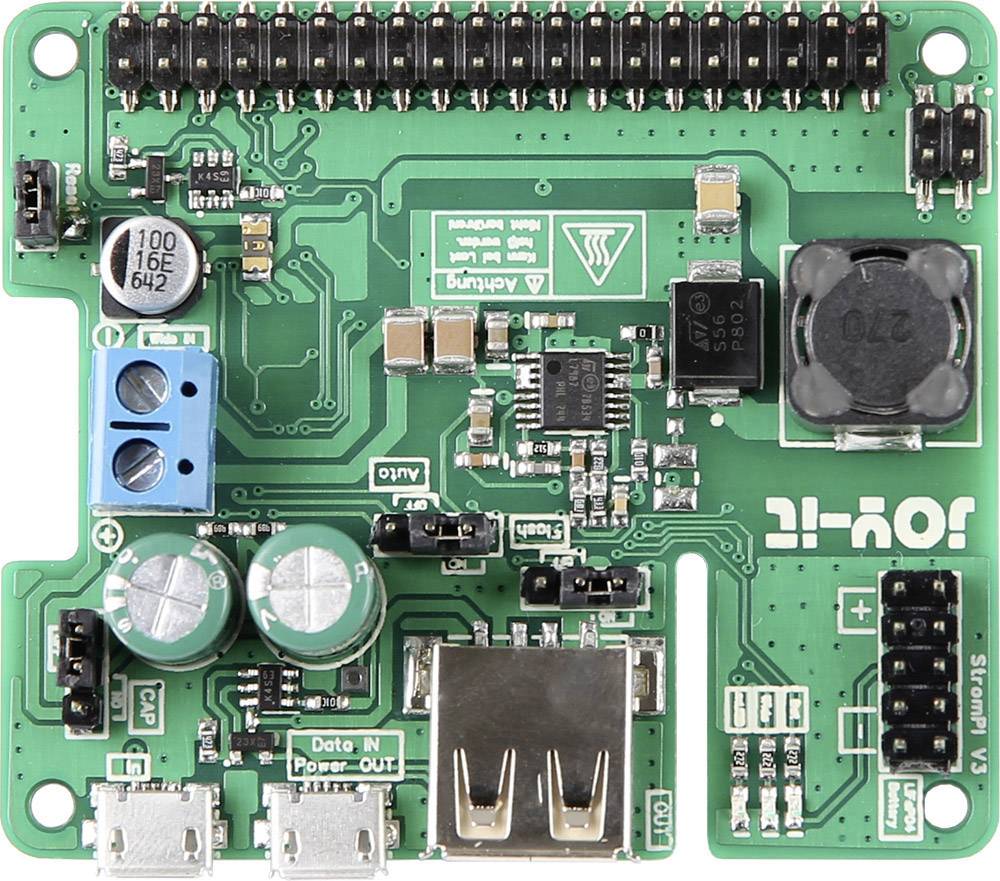 Grüne Platine mit mehreren elektronischen Bauteilen, einschließlich Kondensatoren, Steckverbindern und USB-Anschluss, für technische Anwendungen.
