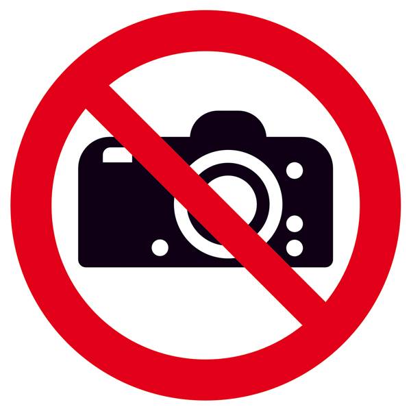 'Fotografieren verboten' Zeichen zeigt eine durchgestrichene Kamera in einem roten Kreis, was darauf hinweist, dass Fotos nicht erlaubt sind.