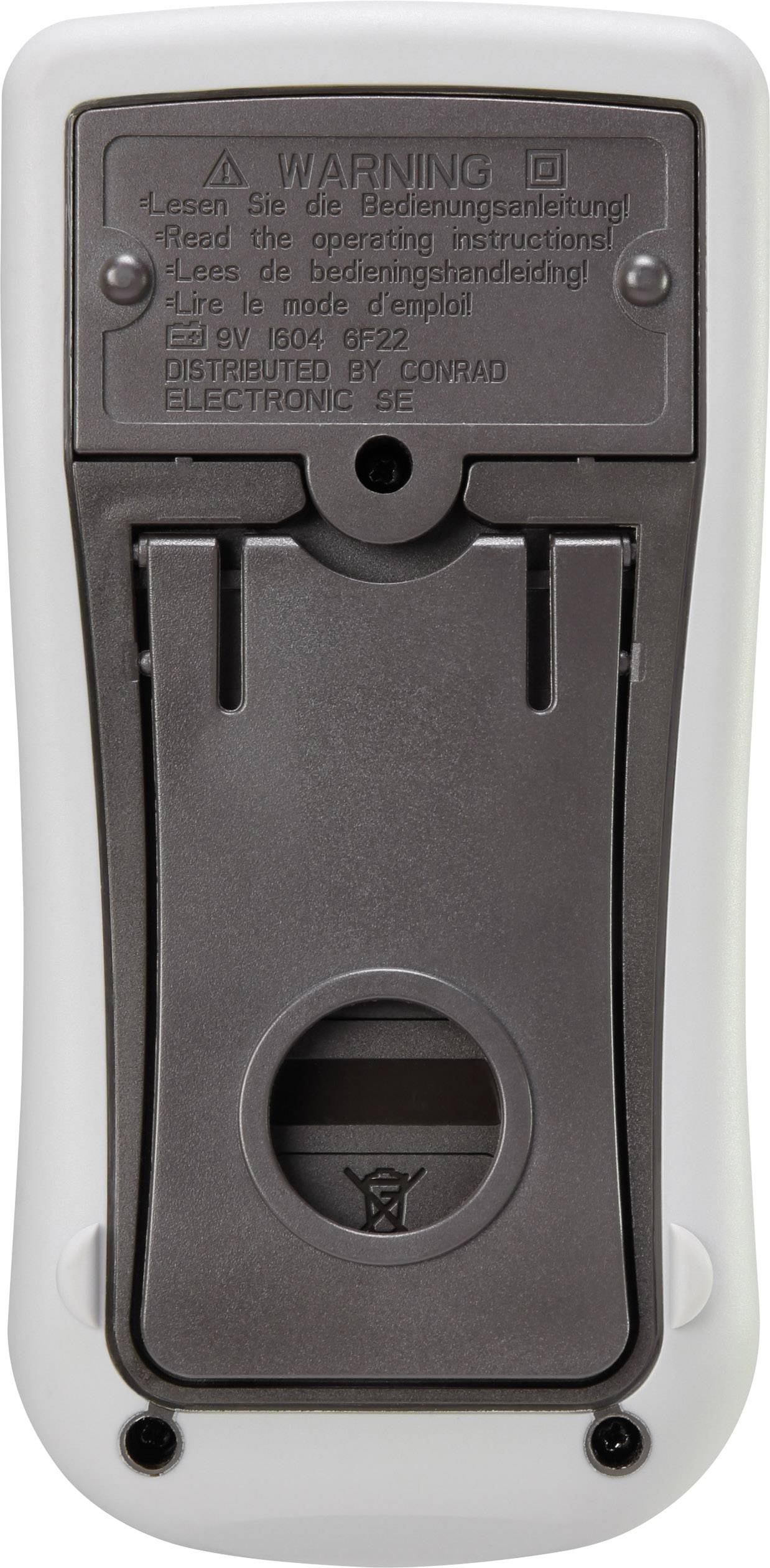 Rückseite eines elektronischen Geräts. Zeigt ein Batteriefach und Warnhinweise in mehreren Sprachen, darunter 'Lesen Sie die Bedienungsanleitung'.