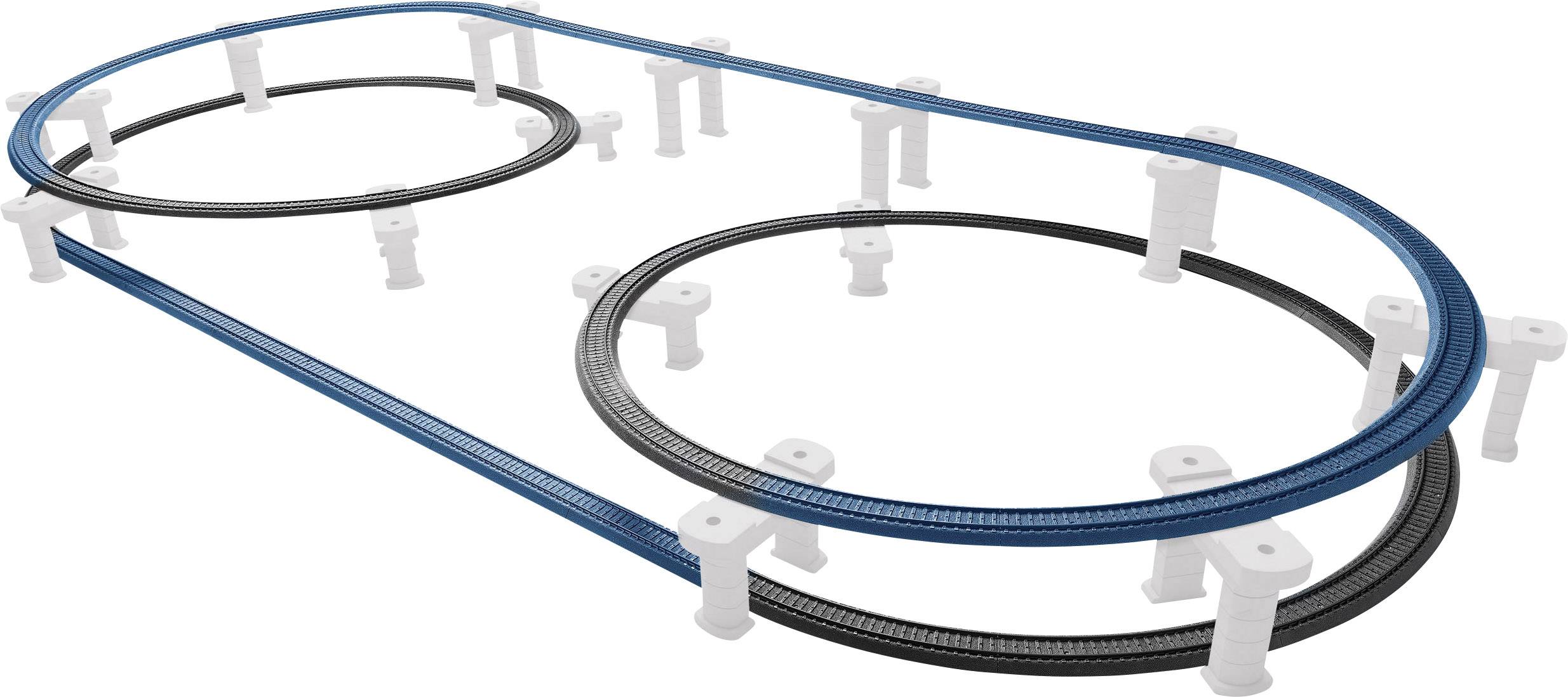 Eisenbahnstrecke mit zwei ineinander verschlungenen Kreisen, einer in Schwarz, der andere in Blau, auf weißen Stützen.