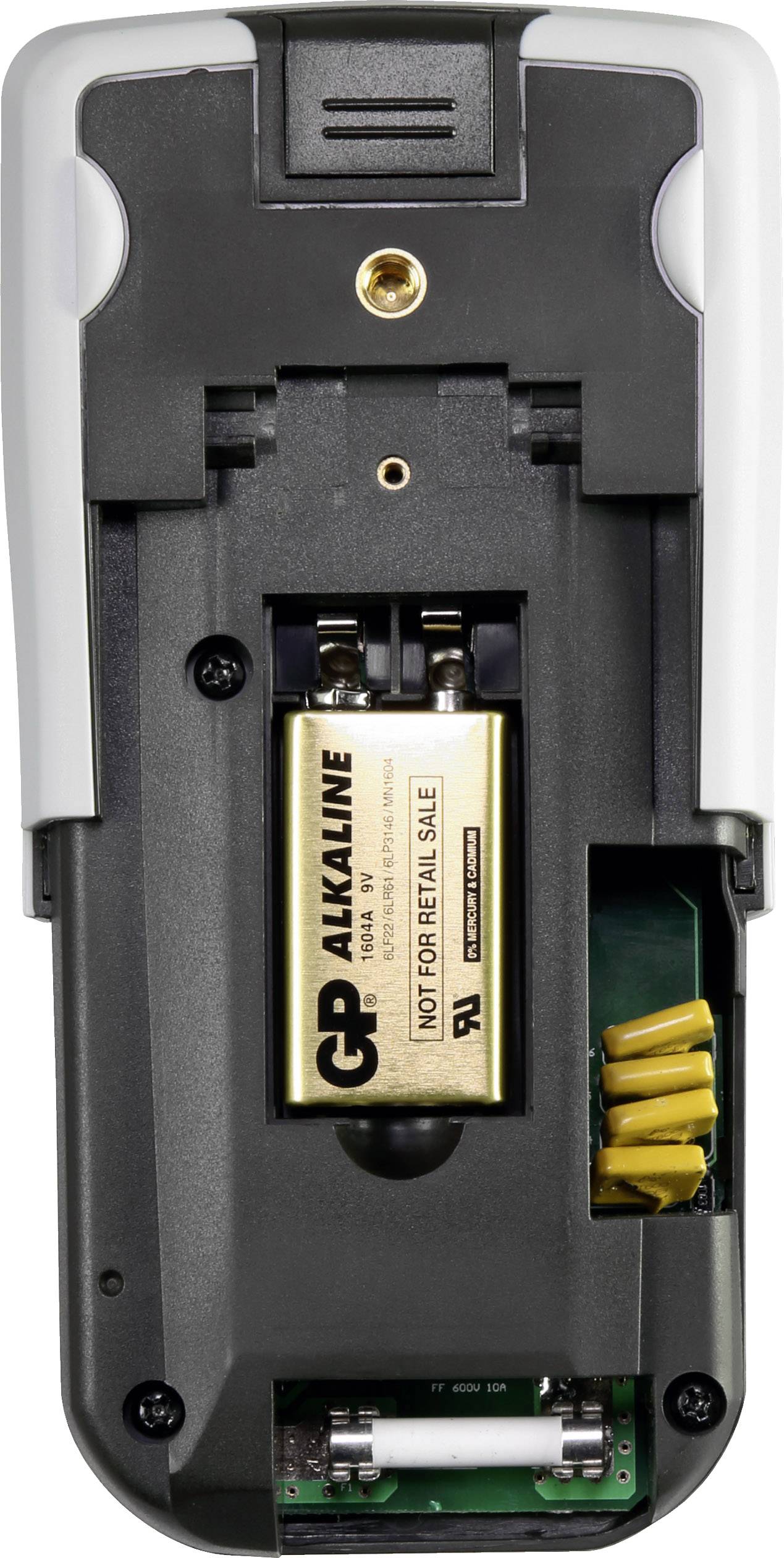 Rückansicht eines Geräts mit geöffnetem Batteriefach, zeigt eine eingelegte 9-Volt-Alkaline-Batterie und Anschlüsse darunter.