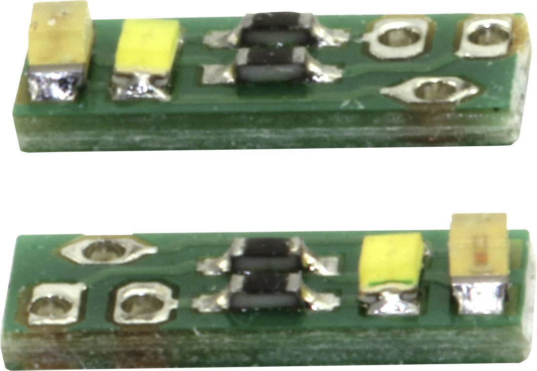Zwei kleine elektronische Bauteile auf einer grünen Platine. Sie enthalten jeweils zwei gelbe Rechtecke und metallene Kontaktpunkte.