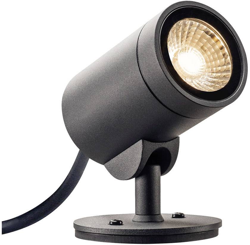 Eine schwarze, zylinderförmige LED-Lampe auf einem runden Sockel, strahlt warmes Licht nach vorne aus. Ideal für Akzentbeleuchtung.