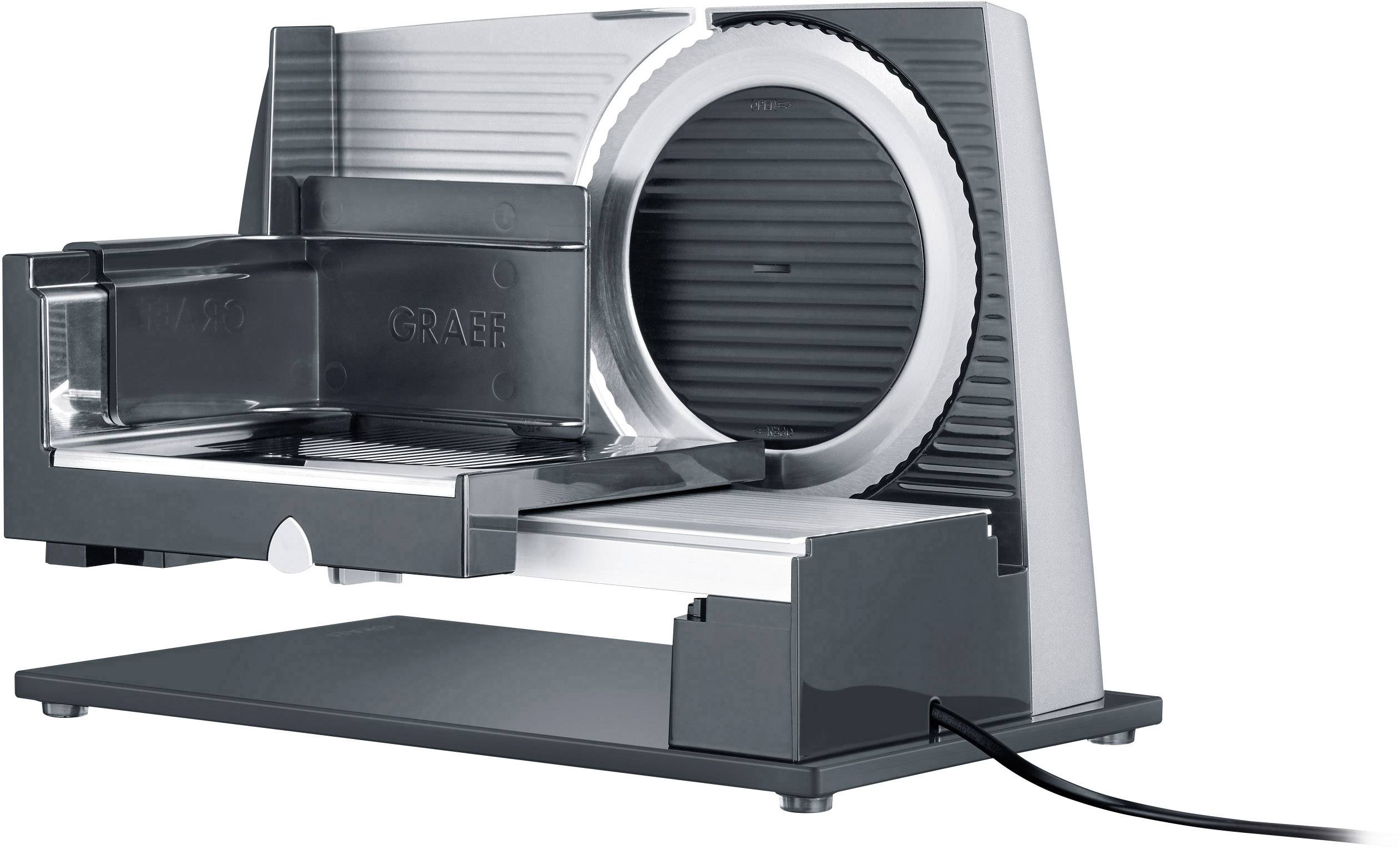 Elektrische Allesschneider-Maschine mit Metallgehäuse. Sie verfügt über einen runden, gezackten Schneidemechanismus und ein Stromkabel.